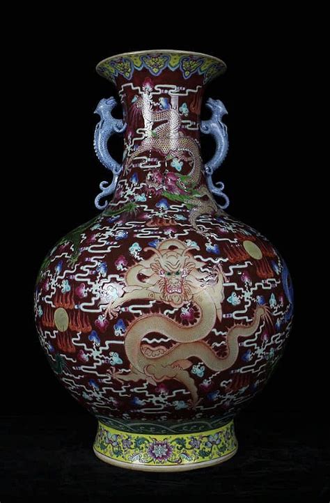 Sold at Auction: A Large Size Famille Rose Nine Dragons Porcelain Vase ...
