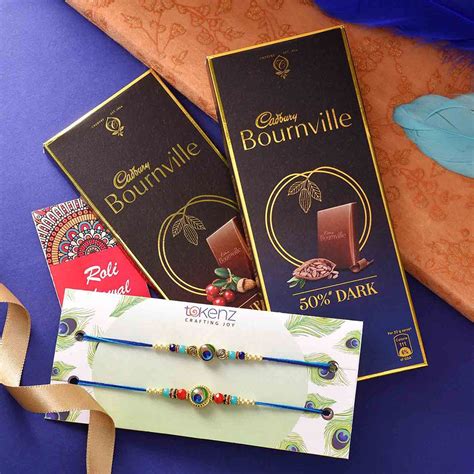 Enchanting Set Of 2 Rakhis With Cadbury Chocolate | CakeGift.in