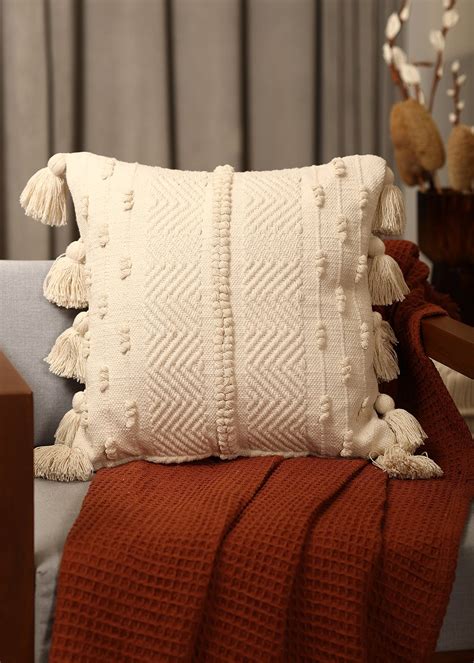 Get Ivory Cushion Cover With Tassels at ₹ 1150 | LBB Shop