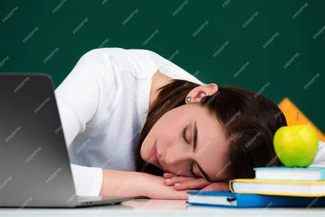 Student sleeping during a lecture in a classroom portrait of tired ...