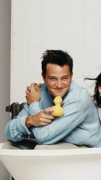 Fans Mourn Matthew Perry Outside Iconic 'Friends' Apartment In NYC