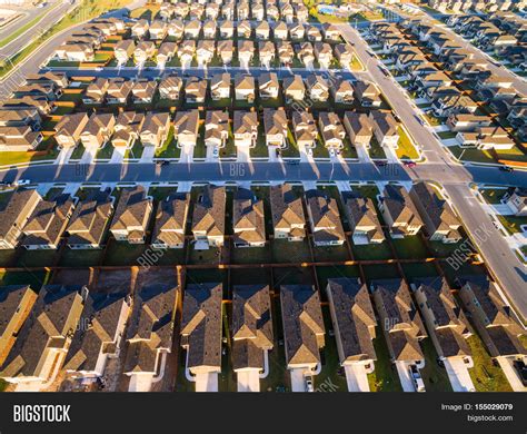 Rows and Rows of Cookie Cutter Houses in Neighborhood Community Suburb ...
