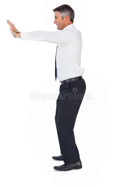 Side View of a Businessman Pushing Stock Photo - Image of caucasian ...