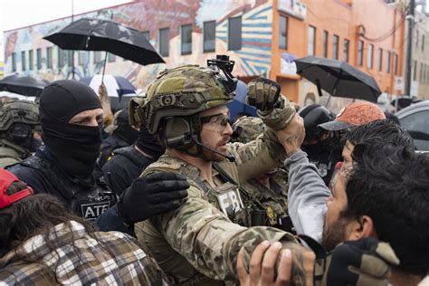 Law enforcement action on Lake Street in Mpls. draws large crowd