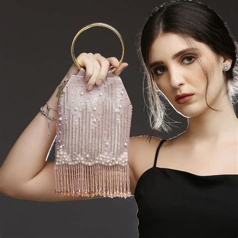 Quirky Tales - Designer Handbags and Clutch bags