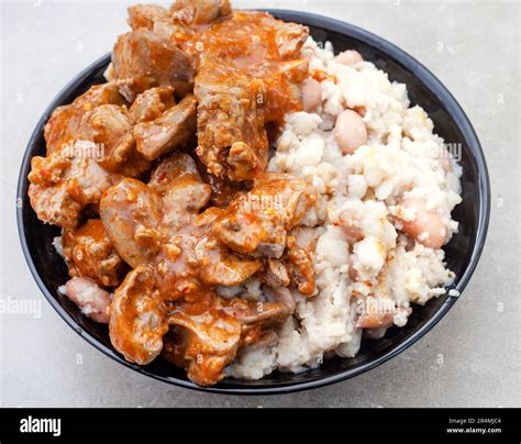 Traditional South African Peri Peri chicken livers with samp and beans ...