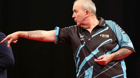 Phil Taylor's darts return ends in quarter-final defeat at World ...