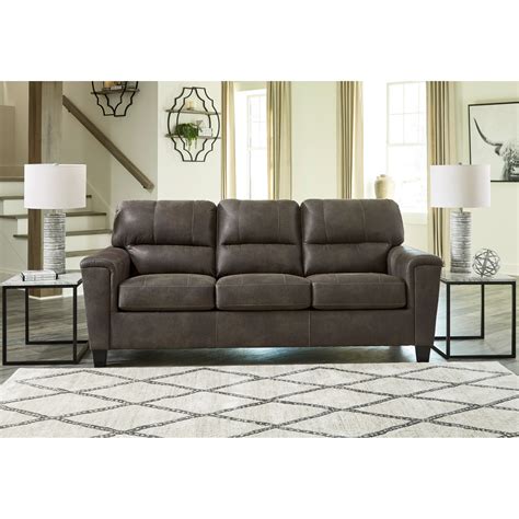 Signature Design by Ashley Navi Faux Leather Sofa | Wayside Furniture ...