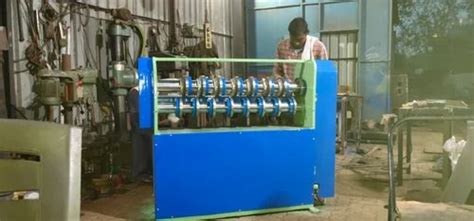 Tin Can Making Machinery - Gang Slitter Machine Manufacturer from Mumbai