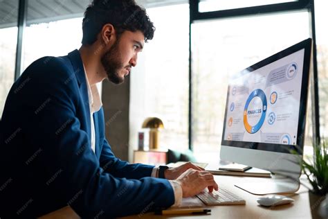 Person in the office analyzing and checking finance graphs | Free Photo