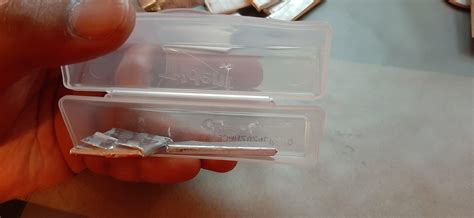 Trident Spearmint Gum, they glue the gum to the bottom of the container ...