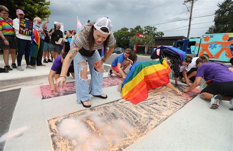 Pictures: Protest at Pulse memorial over rainbow crosswalk removal ...