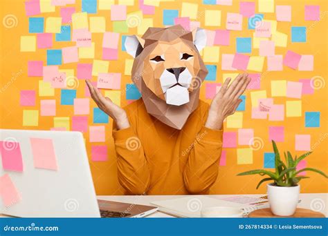 Indoor Shot of Helpless Confused Man in Lion Mask Wearing Orange ...