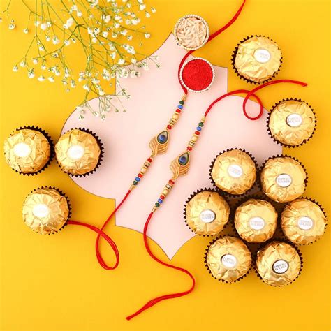 Send Sneh Peacock Feather Rakhi & Ferrero Rocher Box Online ...