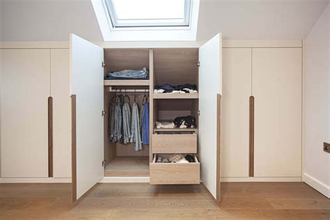 Fitted Scandinaviat style wardrobes in eaves, built in Nordic undereaves cabinets