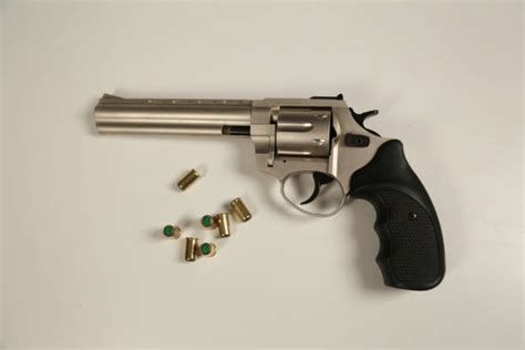 Image result for Bullet Shell Coming Out of a Gun