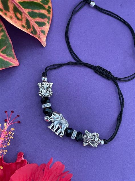 Shop Haathi/Lord Ganesha Black Rakhi Bracelet Online – Digital Dress Room