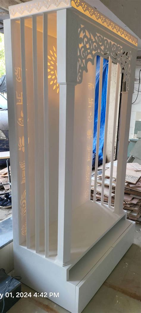 Pooja mandir : Corian Home Mandir with elegant design – Home temple