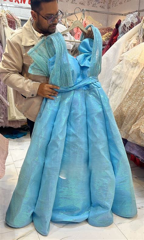 Sky Blue Holographic Shimmer Ball Gown with Structured Ruffle Shoulder ...