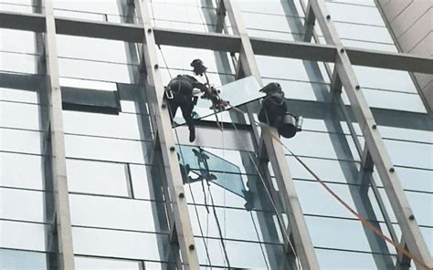 大厦幕墙玻璃更换-南京全美工程配套有限公司苏州分公司