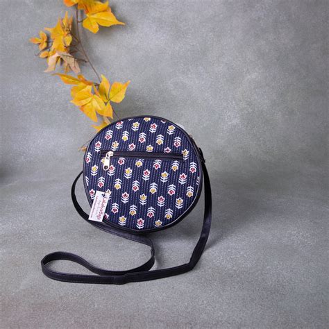 Drum Slings Navy Blue Colour with Yellow Flower Design. – lakshya bags