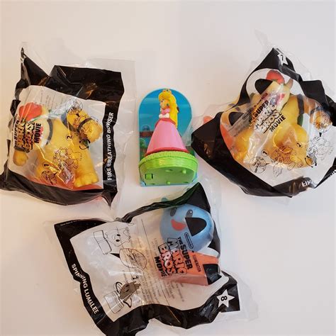 Lot of 4 Super Mario Bros McDonalds Toys Spinning India | Ubuy