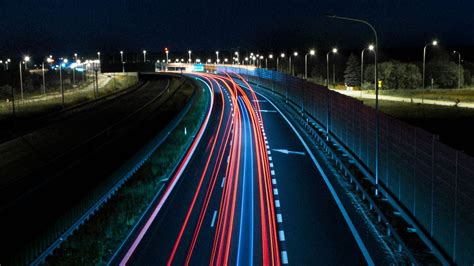 Download wallpaper 1366x768 road, light, direction, night tablet ...