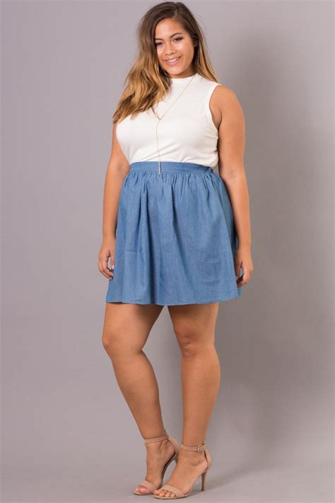 This plus size denim mini skirt features all-over pleating and ...