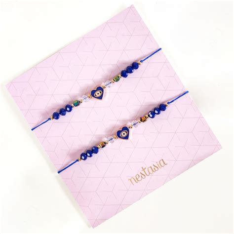 Sacred Sibling Rakhi Duo Gift Hamper Online - Premium Gift Hamper ...