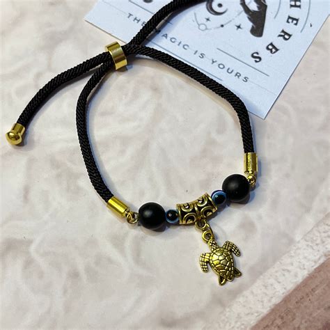 Turtle Charm Bracelet with Black Thread by Crystall and herbs ...