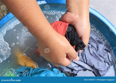 Washing clothes by hand stock image. Image of machine - 61104181