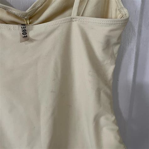 Yellow One Piece Swimsuit. Pale yellow one piece... - Depop