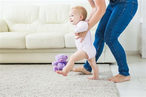 Low section of cute baby at home | Premium Photo