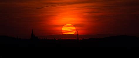 Download wallpaper 2560x1080 buildings, forest, silhouettes, twilight ...