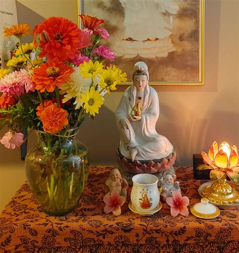 Fresh flowers from the garden as an offering to Guan Yin Bodhisattva ...
