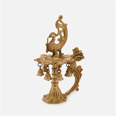 Elegant Brass 7-Face Diya with Antique Finish and Hanging Bells ...