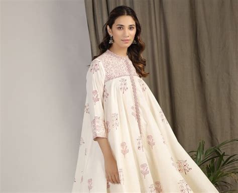 Off White Red Printed Cotton Flared Kurta with Pants - Set of 2