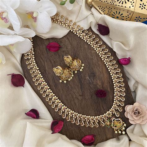 Gold Look Alike AD Stone Lakshmi Neckpiece Red Green - Vriksham G16173 ...
