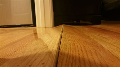 water damage - Hardwood floor split and bulge - Home Improvement Stack ...