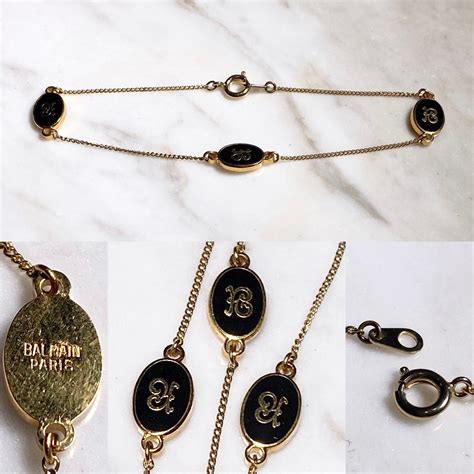 vintage BALMAIN logo charm narrow bracelet | NOIR ONLINE
