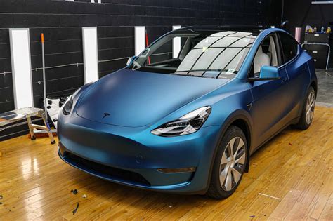 Tesla Model YTinybot metallic night blue wrap | Twiisted Wrap