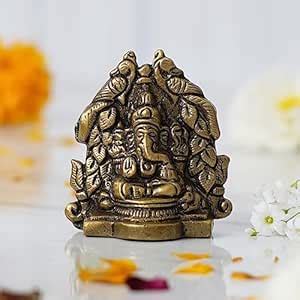 Buy eCraftIndia Metal Handcrafted Golden Lord Ganesha Idol On Peacock ...