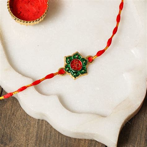Buy Floral OM Red Rakhi Online in India - Mypoojabox.in
