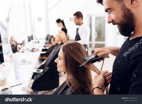 Female Hairdresser Straighten Brown Hair Pretty Stock Photo 1060423220 ...