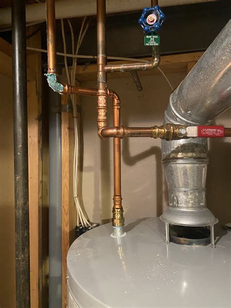 Hot water heater dripping water : Plumbing