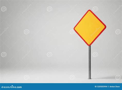 Blank Yellow Diamond Shaped Road Sign on Pole Stock Photo - Image of ...