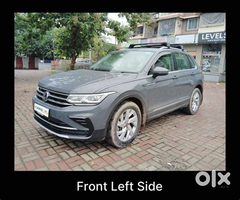 VW TIGUAN 2024 2.0L TSI DSG 4MOTION IN DOLPHIN GREY - Cars - 1816177097