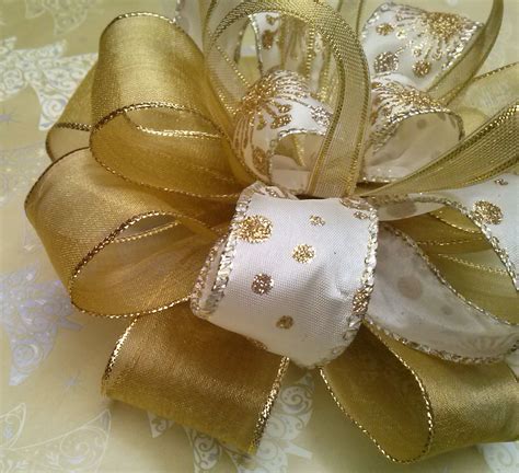 Cream and gold wired ribbon luxury gift bow. | Gift bows, Unique items ...