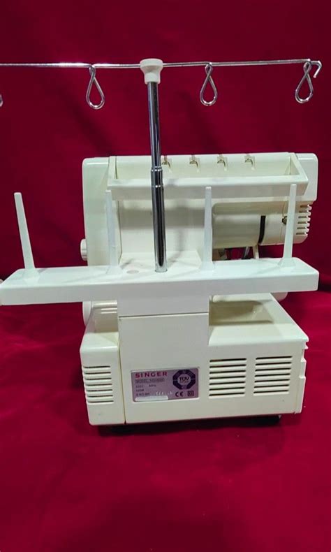 Image result for How to Thread Singer Ultralock