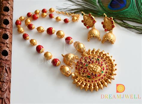 DREAMJWELL - Unique Matte Finish Coral Color Beaded Lakshmi Necklace S ...